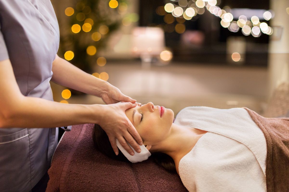 Guest receiving a relaxing head spa treatment at an Upper East Side spa in New York City